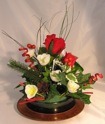 glass dish in wood platter with xmas flower decoration